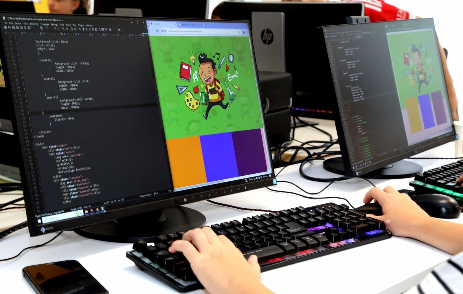 Close-up of a student's screen: HTML and CSS code on the left, the finished web page on the right